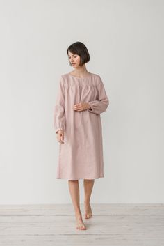 "MONA gather dress made from soft linen in dusty pink. - length is ± 107 cm (42\") (depends on size) - gathered front, back and sleeves - loose fit - without pockets DETAILS: - 100 % European, pre-washed medium weight linen (205 g/m²) - the model is 176 cm (5′9″) high, wearing size S. - model measurements: bust 83 cm (33\") / waist 61 cm (24\") / hips 90 cm (36\") - color in the picture - dusty pink (you can choose other color on the right) MADE TO ORDER: All pieces are made to order, it will ta Pink Long Sleeve Dresses For Night, Pink Long Sleeve Nightgown For Nighttime, Pink Long Sleeve Nightgown, Feminine Long Sleeve Sleep Dress, Feminine Long Sleeve Dress For Sleepover, Feminine Long Sleeve Loungewear Dresses, Feminine Long Sleeve Dresses For Loungewear, Gather Dress, Nightgown Long