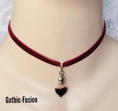 Hello, Today I have for you one of my Eternal Lovers Gothic Vampire Chokers / Collar.  Beautiful and luxurious deep claret red velvet choker finished with a miniature bottle of blood. You can also choose a black velvet choker if you prefer, from the drop down menu. Please choose the length and colour you require from the drop down menu. Each length is adjustable by a further 2". Choker width 6mm. The first picture is a true colour. Designed to sit around the base of the neckline, which is genera Blood Accessories, Vampire Accessories, Blood Necklace, Vampire Necklace, Vampire Jewelry, Vampire Blood, Gothic Choker, Gothic Chokers, Edgy Jewelry