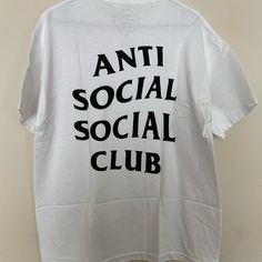 Anti Social Social Club Logo Tee Ss20 New In Bag With Tags. Never Been Worn! This Has A Small Hole On The Bottom Back. This Is A Great Spring And Summer Outfit! Fast Shipping! Product Detail Brand: Anti Social Social Club Model: Tee Color: White If You Have Any Questions Please Don't Hesitate To Message Me. Streetwear Summer Shirt With Logo Print, Summer Streetwear Shirt With Logo Print, Summer Relaxed Fit Shirt With Logo Print, Summer Cotton Shirt With Logo Print, Casual Short Sleeve Shirt With Back Print, Trendy Summer Tops With Logo, Casual Short Sleeve Shirt With Logo, Tan Shirt For Summer Streetwear, Casual Summer Shirt With Back Print