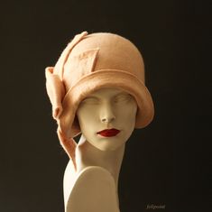 Beige cloche hat , Camel Cloche Felted Hat felt hat Cloche Hat  La belle epoque Art Deco 1920s hat Art Hats   cloche  1920's hat     Cloche hat in beige /camel color. Made from  the highest quality Australian merino wool (18 micro)   Adapts to the head !  Special and unique ! Sophisticated and elegant ! On order I can make the hat in a different size or color. Made just for you !   All my works are made by hand in single copies in the process of long-term, hand felting My products are unique, designed by me, always made from the finest materials. I hope that they will give you a lot of joy.  Thank you for visiting my shop:-) My other hats you can find here: https://www.etsy.com/shop/Feltpoint?ref=hdr_shop_menu&section_id=17484098    Images and all content: FELTPOINT. I save my ideas and de Luxury Beige Women's Cloche Hat, Hand Felting, Cappello Cloche, Fishers Hat, Art Hats, 1920s Hat, Wool Cloche Hat, La Belle Epoque, Felted Hat