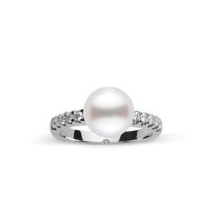 This 9.0-10. mm AAA quality White South Sea pearl ring showcases the pure organic beauty of elegant south sea pearl. The flawless pearl appears to float above the gold, yet is securely attached by a strong post. The classic-style ring features a solid 14-karat gold band that is set with 0.25 carats of diamonds. The ring setting is made in-house and is composed of solid 14 karat gold. We use an extra-fine diamond grade (VS1-G), which is normally reserved for solitaire settings. It's rare to see t Timeless White Akoya Pearl Ring, White Akoya Pearl Timeless Ring, White Akoya Pearl Ring With Pearl Drop, Timeless Pearl White Pearl Ring, White Gold Pearl Ring With Pearl Drop, Timeless Akoya Pearl Ring For Formal Occasions, Timeless Akoya Pearl Drop Ring, Classic Round Pearl Ring With Pearl Drop, Classic Pearl Ring With Pearl Drop