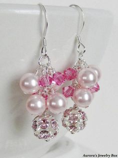 "Details: ~ Rhodium-plated brass and Egyptian crystal, pink ~ Swarovski Crystal Pink Pearls ~ Swarovski Crystal Rose Bicones ~ Sterling Silver Ear Wires ~ Measurements:  1 3/4\" * My jewelry is handmade and made to order * Please allow 1-2 weeks for large/custom orders to be completed * Beautiful Bridal Earrings and Wonderful Gifts for your Bridal Party * Matching Necklace is Also Available (click the link below) * Jewelry will come in a gift box ready for gift giving: either customized or stand Elegant Pink Cluster Earrings, Pink Drop Earrings For Anniversary, Elegant Pink Sterling Silver Bridal Earrings, Pink Sterling Silver Jewelry For Party, Nickel-free Pink Jewelry For Party, Nickel-free Pink Jewelry For Anniversary, Pink Dangle Pearl Earrings With Ear Wire, Pink Dangle Jewelry For Anniversary, Nickel-free Pink Wedding Jewelry