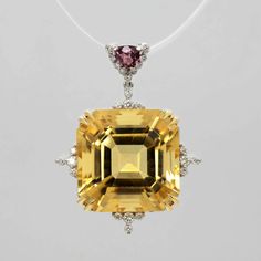 Brighten up your look with precious colours: Diamonds G/SI BR 0.080ct/22pc Citrine 8ct /1pc  Rhodolite Garnet- 0.015ct/1 pc Large - approx 8 carats - square citrine set in white Gold and diamonds with a triangle rhodolite garnet.  Classic design, natural high-quality gemstones at very reasonable price. Mix and match with other designs. Free shipment by Fedex. Decouture is a Collection by Roman Zakharyan.  Long before he began designing jewellery, Roman Zakharyan was held by a fascination with minerals and coloured gems. Aged 30, he moved to Florence to study at the Metallo Nobile Jewellery School, turning his passion into a profession. The Tuscan capital remains as one of the few places in the world where artisans are still creating fine jewellery by hand. Following his graduation, and fur Luxury Brilliant Cut Platinum Gemstones, Luxury Gemstones With Diamond Accents, Luxury Diamond Gemstones For Formal Occasions, Formal White Gold Diamond Gemstones, Luxury Yellow Diamond Gemstones, Luxury Yellow Gemstones For Wedding, Yellow Gold Cubic Zirconia Gemstones For Formal Occasions, Formal Yellow Gold Cubic Zirconia Gemstones, Luxury Diamond Gemstones For Wedding