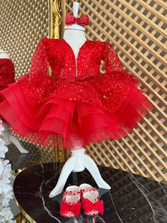 Red Long Sleeve Sequined Baby Girl Dress, Puffy Toddler Christmas Dress, Baby Tulle Christmas Dress, Girls Holiday Tutu Dress This red puffy dress is specially designed and handmade for your baby girl. Your girl will be like a princess with these dresses that she can wear on special occasions such as birthdays, weddings and christmas. This dress, which will create your girl's style with a clasp and shoes, is ideal for special occasions. Check out our baby girl dresses selection for unique handmade dresses from AymiraDesign. ✿ Product Features; ✰ Baby Dress Materials: Sequined Tulle ✰ Baby Dress Color: Red ✰ Set Content: Dress, Clasp, Shoes ✰ Size Options: * 0-3 months, 3-6 months, 6-9 months, 9-12 months, 12-18 months, 18-24 months, 2T, 3T, 4T, 5, 6 US kids' numeric ✰ Note: Shoes are US ch Holiday Tulle Dress With Ruffles, Fitted Christmas Princess Dress With Ruffles, Christmas Tulle Holiday Dress With Ruffles, Fitted Princess Dress With Ruffles For Christmas, Fitted Tulle Princess Dress For Christmas, Christmas Party Long Sleeve Tutu Dress, Red Princess Dress For Party Season Festivities, Fitted Holiday Princess Dress With Ruffles, Holiday Tulle Dress