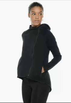 Nike Sportswear Tech Fleece Women's Asymmetrical Cape Jacket Style#: 669613-010 Black Size: XS The Nike Tech Fleece Women's Full-Zip Cape delivers soft, warm comfort for cooler weather. A staple to come from this season's collection, this makes for the perfect modern look. Completed with a full body zip and zipped pockets for keeping the essentials secure. Lightweight warmth Full zip placket Smooth soft feel Zip waist pockets Loose Fit drapes loosely on your body with generous room to let you mo Nike Tech Black, Tech Fleece Hoodie, Nike Sportswear Tech Fleece, Cape Jacket, Zip Up Sweatshirt, Nike Tech Fleece, Capes For Women, Hoodie Zip, Nike Tech