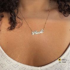 🌻 14K White Gold Carrie Style Script Necklace 🌻 Custom Order Any Name or Word with one capital letter and up to a total of nine letters. 🌻  10.5-11 mm Tall Capital 🌻 Curl on last letter with the following letters: a-e-g-m-n-y 🌻 Please consider upgrading nameplate thickness - max number of five letters for .4mm and a maximum of nine letters for .8mm 🌻 Choose your nameplate thickness, chain length and chain style at checkout 🌻 Production time is 7-14 working days 🌻 Please upgrade your shipping if you would like to expedite delivery 14k Gold Nameplate Necklace With Initials, Classic Name Necklace With Hallmarks For Mother's Day, White 14k Gold Nameplate Necklace, Classic 14k Gold Silver Name Necklace, Classic Silver-colored 14k Gold Name Necklace, 14k Gold Name Necklace In White, White 14k Gold Name Necklace, Silver 14k Gold Name Necklace With Initials, Silver 14k Gold Initials Name Necklace