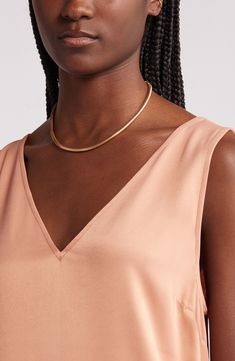 This simple and sleek A-line midi is crafted from luxe silk and topped with dipped necklines. 47" length (size medium) V-neck Sleeveless Unlined 52% viscose, 48% Lenzing™ EcoVero™ viscose Lenzing EcoVero viscose is a sustainably produced fiber using pulp made from renewable wood sources and certified with the EU Ecolabel for high environmental standards, including lower emissions and water usage than generic viscose Machine wash, line dry Imported Gold V-neck Slip Dress For Spring, Elegant Gold V-neck Slip Dress, Chic Gold Sleeveless Slip Dress, Gold Sleeveless Silk Slip Dress, Water Usage, Satin Midi Dress, Nordstrom Dresses, Cork, A Line