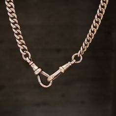 Curb link chains are a classic piece to have in one’s jewelry suite. Chunky, timeless, and hefty in the best way, these vintage 9kt solid yellow gold curb chains are absolutely dreamy. Each individually stamped link feels like smooth like butter, and we love the way the watch chain toggle falls on the neck. And the length on this bad boy? Phew! You simply don’t see them made like this anymore. Whether you’re wearing this curb as a traditional watch chain or an insanely rad chain necklace, there Classic 14k Gold Chain Necklace, Timeless Gold Chain Necklace, Antique Gold Chain Jewelry, Timeless Curb Chain Necklace As A Gift, Antique Style 14k Gold Chain Jewelry, Rose Gold Jewelry With Curb Chain And Oval Link, Timeless Formal Curb Chain Necklace, Formal Link Jewelry With Curb Chain, Formal Necklaces With Curb Chain And Rectangular Links