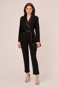 A savvy alternative to the sheath, this tailored jumpsuit will take you effortlessly from day to night. Created in our stretch crepe fabrication this sophisticated all-in-one is cleverly enhanced by a tuxedo-inspired satin collar. While feminine elements, including a tapered leg, faux wrap bodice, and removable waist-cinching sash, ensure a flattering fit. Complement this smart jumpsuit with towering heels and a striking clutch. Dry clean only. 95% Polyester, 5% Elastane. Smart Jumpsuit, Jumpsuit Prom Dress, Jumpsuit Prom, Tuxedo Collar, Beaded Bridesmaid Dress, Chiffon Shift Dress, Tailored Jumpsuit, Dresses Date Night