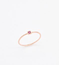 This CERTIFIED Ruby Ring features Genuine Ruby at 2mm (0.03 Carats) set in Solid 14k Rose Gold Ring setting. Designed to stand-alone or stack with the rest of our Stackable Ring collection, this ring would make the perfect July Birthday gift.Solid 14k Yellow Gold ☞ made to last.Click here for ☞ Solid Gold Collection﻿Ruby Details:• CERTIFIED Natural Ruby• Weight: 0.03 Carats• Dimensions: 2mm• Cut: Diamond CutSetting Details:• 2.2 grams of 14k Solid Rose Gold• Dimensions: Band width ≈ 1.3mm, thick Stackable Ruby Ring In 14k Rose Gold, 14k Rose Gold Birthstone Ring, 14k Rose Gold Ruby Ring For Promise, Rose Gold Ruby Ring In 14k Gold For Promise, Stackable 14k Rose Gold Rings, Rose Gold 14k Ruby Promise Ring, Natural Ruby Ring, Gold Letter Necklace, July Birthday