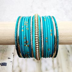 Beautifully designed bangles for any occasion. South asian bracelets come in a variety of styles, colors, and finishes. We at Banglez take creating the perfect bangle set for you to another level! You could say helping you find your favorite stack of bangles as one of our greatest missions. This bangle set was curated in house by one of our talented team members. We hope you love them as much as we do! Bohemian Stackable Wedding Bracelets, Turquoise Bangle Bracelets For Wedding, Turquoise Bangle Bracelet For Weddings, Festive Stackable Beaded Bangle Bracelets, Festive Stackable Bracelets For Festivals, Stackable Festival Bangles, Stackable Bangle Bracelets For Festivals, Stackable Bracelets For Festivals, Festive Stackable Bangle Bracelets