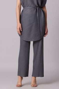 Steel grey tunic with pleated detailing. Paired with matching pant and belt. - Aza Fashions Elegant Asymmetrical Hem Work Pants, Chic Sets With Asymmetrical Hem For Spring, Scarlet Sage, Asymmetric Tunic, Grey Plain, Gray Tunic, Pant Set For Women, Steel Grey, Pant Set