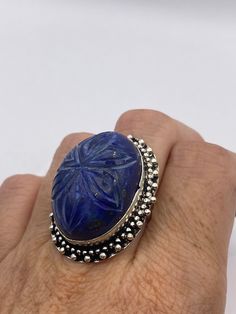 Vintage Blue Flower Carved Lapis Lazuli Ring - Etsy Unique Blue Flower Ring For Gift, Blue Flower Ring For Gift, Blue Gemstone Flower Ring Gift, Artisan Carved Ring As A Gift, Artisan Carved Ring As Gift, Artisan Carved Rings As Gifts, Gift Blue Gemstone Flower Ring, Artisan Carved Rings For Gift, Elegant Blue Carved Jewelry