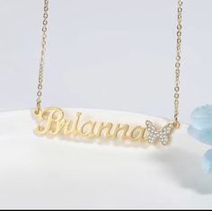 Show some love this holiday season with this beautiful Custom Name Necklace with iced out butterfly. Gift it to someone special or make it your own. Perfect match for any outfit and any occasion. Lovalita name necklaces are versatile enough to wear it everyday. Wear it alone, or layer it up with other necklaces. Makes perfect gifts for Girlfriends, Moms, Grandmas, daughters, or best friends. 100% nickel free. Made from high quality stainless steel with 14k Gold plating that won't fade. *Comes in Trendy Bling Necklaces For Gifts, Trendy Bling Necklace For Gift, Trendy Necklace For Gift, Butterfly Necklace For Birthday And Mother's Day, Silver Butterfly Necklace For Birthday, Gold Bling Name Necklace As A Gift, Trendy White Butterfly Necklace Gift, Personalized Elegant Butterfly Necklace, Elegant Personalized Butterfly Necklace