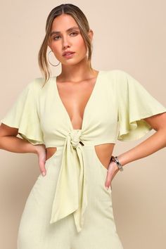 Once you arrive at your destination, enjoy the warm breeze and the Lulus Summer Journey Light Green Tie-Front Cutout Jumpsuit! Lightweight linen-blend woven fabric shapes this breezy jumpsuit with a deep V-neckline, a tie-front bodice, and fluttering short sleeves. A fitted waist with side cutouts sweeps down to a flowy wide pant legs. Hidden back zipper/clasp. Fit: This garment runs large - please size down. Length: Floor length. Size medium measures 56.5" from shoulder to hem. Inseam: 27.00 Fr Cutout Jumpsuit, Lulu Fashion, Green Tie, Wide Pants, Wide Leg Jumpsuit, Linen Blend, Woven Fabric, Floor Length, Light Green