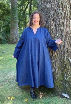 Kali Tunic Dress in 100% Cotton Denim is an effortless style for plus size women. Made in USA. Peaches is an online store featuring natural fibers, sizes 1x - 10x. Petite, tall, have a larger belly? We have made to order clothing . Our casual plus size outfits are comfortable and have style. A quality plus size fashion closet includes cotton and linen outfits. Pants, dresses, skirts, shirts, jackets, we have all. Plus size style apparel USA. Shown with cotton leggings Spring V-neck Tunic In Lagenlook Style, Spring V-neck Lagenlook Tunic, Fall Split Neck Tunic, Casual Fitted Kurta For Fall, Casual Fitted Fall Kurta, Spring Lagenlook Long Tunic, Spring Long Sleeve Relaxed Fit Kurta, Fitted Long Sleeve Lagenlook Tunic, Fitted Lagenlook Long Sleeve Tunic