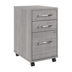 a gray filing cabinet with three drawers on wheels