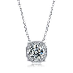 Beautifully crafted, this bezel moissanite pendant has a single round brilliant-cut moissanite surrounded by sparkling micropavé gem, a petite necklace that complements any ensemble. Features Moissanite was originally found in meteorites(Chemical name: Silicon Carbide). It was first discovered in 1893, while a scientist was examining meteor samples from a crater in Arizona. After many years, the experts has been recreated moissanite in the laboratory, that make the gemstone with friendly, and ha Round Moissanite Necklace With Halo Setting, White Gold Moissanite Necklace With Halo Setting, Dazzling Moissanite Round Pendant Necklace, Cubic Zirconia Round Pendant Necklace With Halo, Moissanite Pendant Necklace With Halo Setting, Petite Necklace, Moissanite Necklace, Round Moissanite, Stone Cuts