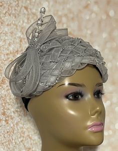 Gray and Silver Fascinator Half Hat for Church, Tea Party, Weddings, and Special Occasions. Millinery hat braid, bead trim and crinoline/horse hair and hat pin. Red Head covering for church and headwear. The hat measures 10X7 inches SHIPPING All items for free shipping will be shipped via USPS FIRST CLASS MAIL. Gifts for mom, sister, wife, or yourself. Adjustable Costume Hat For Party At Kentucky Derby, Adjustable Mini Hat For Kentucky Derby Party, Adjustable Headpiece For Kentucky Derby Evening, Elegant Hat For Evening, One Size Fits Most, Adjustable Gatsby Style Costume Hats For Evening, Elegant Evening Hats, One Size Fits Most, Elegant Adjustable Headband Fascinator, Elegant Bead Cap Headband, Adjustable Gatsby Evening Headpiece