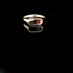 Inspired by the guiding light of the North Star and the rich symbolism of the Garnet gemstone, our newest signet ring is a true statement piece. This design merges the brilliance of Polaris, known as Stella Maris or "Star of the Sea" during medieval times, with the deep, fiery essence of Garnet. Polaris, used for navigation, symbolized guidance and protection, while the Garnet, with its associations with love, inner fire, and life force, represents lasting bonds of friendship and passion. Produc Modern 14k Stamped Jewelry For Promise, Modern Gemstone Signet Ring, Modern Gemstone Signet Promise Ring, Modern Gemstone Signet Ring For Promise, Symbolic Gemstone Jewelry For Formal Occasions, Modern Signet Ring With Gemstone For Promise, Modern Ruby Promise Ring With Polished Finish, Symbolic Gemstone Rings For Formal Occasions, Modern Signet Ring With Birthstone For Promise