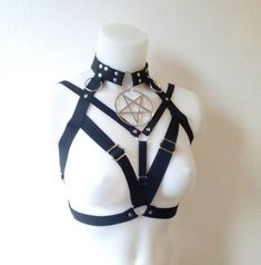 Harness made entirely of strong elastic straps. Every strap is adjustable with regulators. Available in several sizes.Two options available :      1.with pentagram      2.simple designmy processing time ( time I need to make and ship this item ) is 2-3 weeks estimated delivery for : -USA : 3-4 weeks -Europe : 1-2 weeks  there can be delays sometimes ,but that is not up to me ,it˙s up to postal service or customs ..message me if you don´t receive your item in 6 weeks . Goth Emo Outfits, Black Punk Harness With Adjustable Straps, Punk Harness With Adjustable Straps, Black Gothic Harness With Adjustable Straps, Punk Strapped Harness For Cosplay, Punk Strapped Fitted Harness, Harness Fashion, Devil Costume, Pentagram Pendant