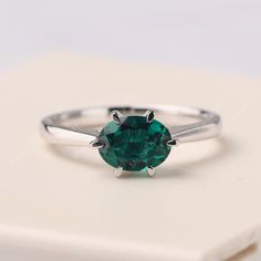 All HANDMADE ITEMS SHIP IN APPROX 8 DAYS Main Stone: Lab created emerald Main Stone Size:Oval cut 8 mm x 6 mm Main Stone Weight: 1.14 carat Side Stone: None Height From The Ring Setting Bottom(to gemstone top): about 5.85 mm Width of Ring band Measure: gradually varied,about 2.0 to 1.2 mm Material: 925 Sterling Silver/14K White Gold/14K Yellow Gold/14k Rose Gold Engraved: Available For FreeNo more than 13 letters) Customized:Of course! Tell me what you want Includes With Order: All of my store i Emerald Ring With Diamond Cut, Green Oval Diamond Ring In Sterling Silver, Oval Diamond Cut Ring For May Birthstone, Oval May Birthstone Diamond Ring With Diamond Cut, Oval Emerald Birthstone Ring In White Gold, Oval Green Emerald Ring With Diamond Cut, Green Oval Emerald Ring With Diamond Cut, Oval Emerald Ring With Diamond Cut In Green, Oval Diamond-cut Emerald Ring