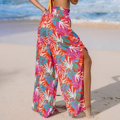 Get ready to sizzle in style with CUPSHE Women's Smoked Cover Up Pants! Perfect for summer days by the beach, these wide-leg bottoms with side slits and sheer tropical design are your ultimate go-to for trendy beachwear. The bathing suit cover up pants will catch everyone's attention on every occasion. It's great for casual style, daily look, home, shopping, hanging out, lounging, vacation, holiday, beach, cocktail party, tea party, club, night out, evening, dinner, romantic date. Product code: Bohemian Multicolor Bottoms For Vacation, Multicolor Summer Beach Cover-up Bottoms, Multicolor Beach Pants For Beach Season, Multicolor Beach Pants For Spring, Multicolor Pants For Beach And Spring Season, Multicolor Spring Beach Pants, Spring Multicolor Beach Pants, Red Bohemian Bottoms For Vacation, Summer Beachwear Bottoms For Summer Outings