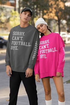 Welcome to Mask Couture By A.M, 🏈SORRY. CAN'T. FOOTBALL. BYE. (WITH SLEEVE DESIGN) ON OUR UNISEX SWEATSHIRTS.  🤩 WANT TO ADD A CUSTOM NAME TO 1 SLEEVE OR THE UPPER BACK OF THIS SWEATSHIRT???  BE SURE TO ADD THE ADD-ON 👇🏼 LISTING BELOW TO YOUR CART! 🤩 https://maskcouturebyam.etsy.com/listing/891811241/add-additional-text-change-design Makes A great Gift For Yourself And Your Football Loving Bestie  It's The PERFECT Football Lovers Sweatshirt To Cozy Up In Or Run Errands (BE SURE TO LET US KN Athletic Heather Long Sleeve T-shirt With Letter Print, Long Sleeve Top With Team Name For Fall, Football Season Streetwear Tops With Text Print, Streetwear Tops With Text Print For Football Season, Fall Sports T-shirt With Letter Print, Varsity Tops For Fall Sports Events, Varsity Tops For Sports Events In Fall, Pink Varsity Tops For Game Day, Varsity Style Tops For Fall Sports Events