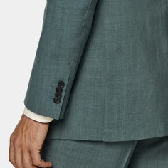 A sleek double-breasted suit in a muted green, this 6-button Havana is tailored to a slightly widened slim fit, bringing an updated touch to a timeless fit. Elegant Green Suits With Button Closure, Semi-formal Green Blazer With Double Button Closure, Fitted Green Blazer With Buttons, Green Semi-formal Suit With Buttons, Green Fitted Blazer With Buttons, Tailored Dark Green Business Suit, Classic Dark Green Business Suit, Classic Green Three-piece Suit Single Breasted, Classic Green Three-piece Suit For Semi-formal Occasions