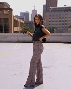 Feel classy and powerful in the Plaid About You Pants! These unique trousers are woven in a timeless plaid pattern with a sophisticated crossover button detail. The high rise and straight leg of these pants lend them a look of sharp professionalism, perfect for any office or work environment. Crafted from a soft and stretchy fabric, these elevated pieces offer year-round comfort that will make it easy to stay focused all day. This style runs small at the waistline - we recommend sizing up if bet Plaid Trousers Outfit Work, Plaid Trousers Women, Weekend Lunch Outfit, Plaid Pants Outfit Women, Trousers Outfit Work, Plaid Trousers Outfit, Unique Trousers, Plaid Pants Outfit, Women Business Casual