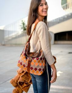 Nice and flexible brown fabric shoulder bag woven with diamond fabric in orangn and earth tones, easily convertible into a backpack, just by pulling its side handles, and thus distribute the weight of your bag on both shoulders, and leave your hands free. It is a practical convertible bag that you can use as a backpack on your trips and excursions, and easily switch to a bag when you need it (you can carry it as a backpack to walk around the city, and turn it into a bag when you arrive at your a Fall Travel Hobo Bag, Rectangular, Fall Travel Rectangular Hobo Bag, Brown Hobo Bag With Adjustable Handle For Travel, Brown Hobo Bag With Adjustable Handle For On-the-go, Versatile Brown Hobo Bag With Adjustable Handle, Orange Bag With Adjustable Strap For Fall, Orange Fall Bag With Adjustable Strap, Beige Hobo Bag For Fall Travel, Brown Hobo Bag For Travel In Fall