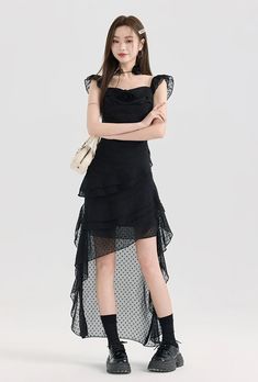 Embrace your edgy side with this Tiered Ruffle Midi Dress with Floral Detail that masterfully balances nonchalance with a touch of sophistication. Crafted for modern aesthetics, this midi dress features delicate ruffles that cascade down for an eye-catching effect. The square neckline and sleeveless design add a contemporary touch, while the A-line silhouette and high waist offer a flattering fit. The dress's solid color serves as a canvas for personal expression, crafted from a lightweight fabr Prom Dresses With Ruffled Midi-length Skirt, Prom Dresses With Ruffled Midi Skirt, Prom Dresses With Ruffled Skirt And Midi Length, Prom Dresses With Ruffled Skirt In Midi Length, Flirty Tiered Skirt Evening Dress, Summer Midi Dress With Ruffle Hem For Prom, Fitted Midi Prom Dress With Ruffle Hem, Ruffled Midi Dress For Prom, Fitted Ruffle Dress With Layered Hem For Party