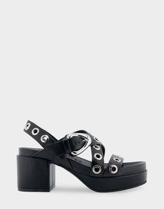 Cleveland Edgy Summer Platform Sandals, Edgy Synthetic Sandals For Summer, Edgy Spring Platform Sandals, Edgy Summer Platform Heels, Chic Strapped Synthetic Sandals, Spring Leather Sandals With Strap Detailing, Edgy Spring Sandals With Buckle Closure, Leather Sandals With Strap Detailing For Spring, Trendy Platform Slingback Sandals