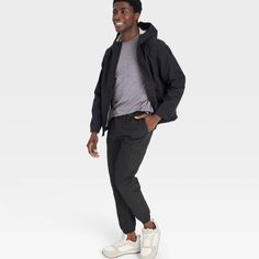 Why we're ALL IN: Solid-hued cargo jogger pants made from quick-dry fabric with moisture-wicking properties to help keep you cool and dry during a range of activities. Designed in a tapered-leg silhouette with elastic at the leg openings for a snug, stay-put fit. Side zipper pockets and side cargo pockets complete the look with functional flair. All in Motion™: Made for every move, priced for every day. Casual Pants With Pockets In Recycled Polyester, Outdoor Techwear Sweatpants With Relaxed Fit, Casual Waterproof 4-way Stretch Bottoms, Black Joggers With Functional Pockets For Outdoor, Black Joggers With Functional Pockets For Outdoor Activities, Outdoor Sportswear Sweatpants With Cargo Pockets, Stretch Sweatpants With Cargo Pockets For Outdoor, Relaxed Fit Athleisure Cargo Pants For Hiking, Relaxed Fit Cargo Pants For Outdoor Sportswear