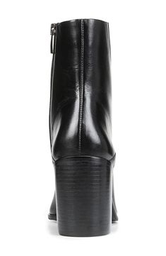 Asymmetric seams and tonal stitching amplify the modern appeal to a luxe leather bootie balanced by a pointy toe and stacked block heel. 3 1/4" heel 5 1/2" shaft Leather upper/synthetic lining and sole Made in Brazil