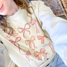 Online Exclusive | Coquette Bow Long Sleeve Graphic Sweatshirt in Cream - Giddy Up Glamour Boutique Coquette Long Sleeve, Bow Coquette, Giddy Up Glamour, Iron Decoration, Coquette Bow, Iron Decor, Soft Fabric, Casual Looks, Soft Fabrics