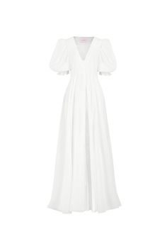 Vacation to a bygone era with The Ivory Sunroom Cover-Up, a dreamy maxi-length cotton gauze dress that embodies the carefree spirit of the Côte d'Azur. The center-front hidden snap closures create a sleek and uninterrupted flow, while the mid-length puff sleeves, cinched with elastic cuffs, add a playful and feminine flair. Reminiscent of the iconic dressing gowns in Valley of the Dolls, this is the perfect beach coverup for those seeking a blend of old-school prestige and modern refinement. Sty Cotton Gauze Dress, Silk Dressing Gown, Corset Skirt, Puff Dress, Gauze Dress, Button Up Dress, White Maxi, Maxi Gowns, Sweater Accessories