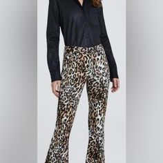 A Pretty Print Enriches High-Waisted Cropped Pants Cut In A Kicky Flare-Leg Silhouette. Zip Fly With Button Closure Five-Pocket Style 54% Cotton, 35% Modal, 8% Elastomultiester, 3% Polyurethane Machine Wash, Tumble Dry Imported Model Stats: 5'10" Height, 32" Bust, 25" Waist, 36" Hip Chic Leopard Print Workwear Bottoms, Fitted Elegant Leopard Print Bottoms, Elegant Fitted Leopard Print Bottoms, Chic Fitted Leopard Print Bottoms, Chic Leopard Print Bottoms For Fall, Fitted Leopard Print Pants For Fall, Leopard Print Pants For Night Out In Fall, Casual Leopard Print Bottoms For Night Out, High Waisted Cropped Pants