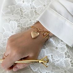 Gold Heart Locket Bracelet with Toggle Clasp, Photo Picture Locket, Bridesmaids Gift, Valentine Gift, Gold Plated Stainless Steel Bracelet https://etsy.me/35VfqhM #birthday #lovefriendship #toggle #artnouveau #locketbracelet#heartlocket#photolocket#chunkybracelet Gold Metal Heart Bracelet For Wedding, Heart-shaped Charm Bracelet For Wedding, Heart-shaped Metal Bracelets For Wedding, Heart Shaped Metal Bracelets For Wedding, Adjustable Heart-shaped Charm Bracelet For Wedding, Adjustable Heart-shaped Wedding Charm Bracelet, Adjustable Chain Bracelet For Wedding On Valentine's Day, Metal Bracelets For Wedding And Mother's Day, Heart Charm Chain Bracelet For Wedding And Valentine's Day