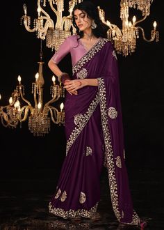 Experience the epitome of elegance of Embroidered Designer tissue Jimmy Cho Silk Saree. Crafted from premium satin silk, this saree features exquisite embroidery that adds a touch of opulence to its luxurious drape. Perfect for special occasions, it combines traditional artistry with contemporary sophistication, making you stand out with timeless grace. --------------------------------- S A R E E ● D E T A I L S --------------------------------- ● Fall and Edging : Done ● Tassel : See in Option Drapping Saree, Saree Beautiful, Tissue Silk Saree, Embroidery Border, Purple Saree, Organza Silk Saree, Purple Wine, Casual Saree, Contrast Blouse