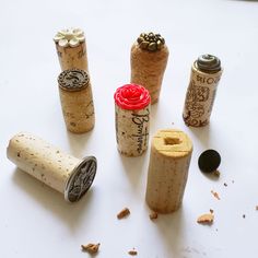 several corks with different types of buttons on them