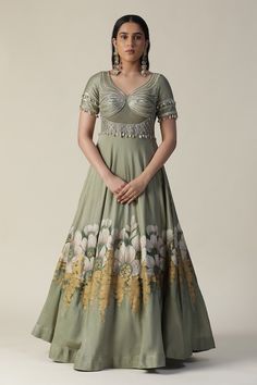 Green anarkali featuring handpainted floral motifs, cut-out bodice embellished by sequins and shell tassels. - Aza Fashions Anarkali Patterns, Green Anarkali, Gown With Dupatta, Pista Green, Anarkali Gown, Dupatta Set, Green Hand, Beaded Neckline, Organza Dupatta