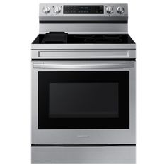 a stainless steel oven with the door open and an electric stove in front of it