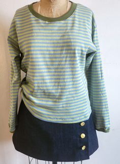 Womens Knit Top, Womens Striped Top, Blue & Green Striped Top, Relaxed Fit Long Sleeve Striped Tee * Soft, comfortable, midweight 100% cotton * Olive Green neck and sleeve cuff ribbing with side seam piping detail * Relaxed fit long sleeve top with drop shoulder * Striped Blue & Green adds a pop of color to any outfit Machine wash cold, tumble dry low setting. MODEL:  She's  5' 7", weight 125 lbs, wearing size M shirt. SHIPPING TIME Each top is made to order.  Allow 1 week for production before ready to ship. Please review the Body Measurement Chart to determine your size. Feel free to contact us with any questThanks! SEE BODY MEASUREMENTS CHART ATTACHED WITH PHOTOS, IN INCHES AND CENTIMETERS. Blue Cotton Stretch Long Sleeve Top, Blue Stretch Cotton Long Sleeve Top, Blue Stretch Crew Neck Long Sleeve Top, Blue Long Sleeve Cotton Knit Top, Fine Knit Striped Tops For Spring, Striped Long Sleeve Fine Knit Top, Striped Fine Knit Long Sleeve Top, Blue Knit Crew Neck Top, Casual Striped Fine Knit Tops