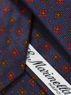 E. Marinella Ties | Wide Neckties E. Marinella New Collection - Genuine E. Marinella tie, classic lapis / red geometric design, fancy silk, hand made in Italy. Color: Lapis / Red Fabrics: 100% Silk, Self Tipped Size: Width: 3.15"/ 8cm, Regular Length 58" Origin: Hand Made in Italy Brand: E. Marinella Napoli Original E. Marinella Gift Box ( Flat ) Upon Request Genuine / Authentic Product code: mari220321 E. Marinella is a sartorial quality brand from Napoli, Italy. The E. Marinella tie designs ar Designer Workwear Ties, Elegant Multicolor Formal Neckwear, Elegant Multicolor Neckwear With Ties, Elegant Multicolor Neckwear For Business, Elegant Multicolor Business Neckwear, Elegant Multicolor Silk Neckwear, Red Silk Tie For Business, Red Silk Ties For Business, Elegant Red Silk Tie