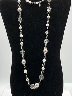 Gorgeous silver and white beads and silver tone chain necklace by Lia Sophia. White Metal Beaded Necklaces With Beaded Chain, White Pearl Necklace With Silver Chain, White Metal Beaded Necklaces With Round Beads, Silver Pearl Beaded Necklaces, Silver Metal Pearl Necklace With Beaded Chain, White Beaded Metal Chain Necklace, Silver Pearl Beaded Long Necklace, Silver Pearl Necklace With Beaded Chain, White Pearl Necklace With Round Beads