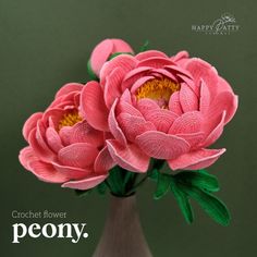 two pink flowers in a vase with the caption peony