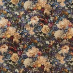 an image of a flowery fabric with many colors and sizes on it's surface