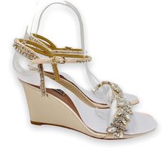 Badgley Mischka Women's Jenna Jeweled Wedge Sandals / Heels. Colorway Is Soft Nude. Women's Size 6.5. Condition: New Without Box. New To Poshmark? Sign Up Using Invite Code: Tentoday For $10 Off Your Purchase! An Embellished Evening Wedge Is A Great Alternative To A Sky-High Heel. Still Giving You The Extra Lift Without Compromising On Style, The Jenna Wedge Is Wrapped In Satin And Features A Simple Crystal Embellished Ankle Strap With Buckle Closure And An Elaborate Toe Strap Adorned With An Ar Chic Wedge Heel Wedding Sandals, Chic Wedge Heel Sandals For Wedding, Chic Ankle Strap Wedge Sandals For Wedding, Glamorous High Heel Wedge Sandals For Wedding, Elegant Wedge Heel Wedding Shoes, Elegant Wedge Heel Wedding Shoes For Parties, Elegant Wedding Shoes With Wedge Heel, Elegant Gold Wedge Sandals For Wedding, Glamorous Round Toe Wedge Sandals For Wedding