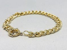 Beautiful 14K Yellow Gold Curb Bracelet with alternating textured links, 7.75" long and 1/4" wide. (7.05mm). Designer clasp and end caps. Weighs 11.5 grams. Formal Yellow Gold Bracelets With Hook And Links, Elegant Formal Chain Bracelet With Hook And Links, Formal Gold Bracelet With Oval Link And Hooks, Formal Gold Oval Link Bracelet With Hook, Chain Link Bracelet, Link Bracelets, Chain Link, Halloween Shopping, Beauty Book